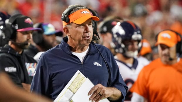 Denver Broncos head coach Sean Payton watches play against the Kansas City Chiefs during the first half at GEHA Field at Arrowhead Stadium.